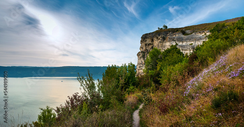 A beautiful panoramic view of the Bakota canyon with Dnister river and blue sky. Podilsky Tovtry, Ukraine. photo