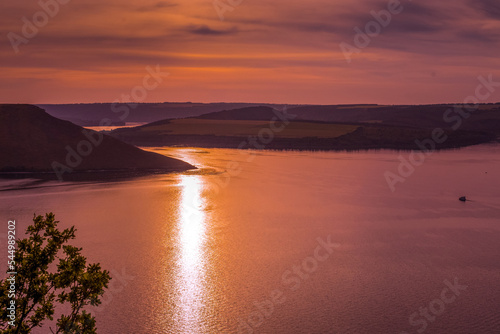 Bakota Canyon of the Dniester River, a violet sunset with picturesque sky and...