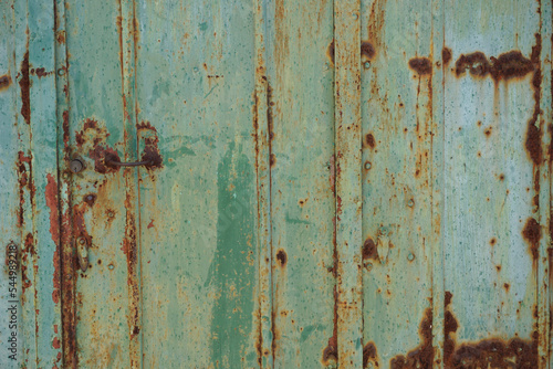 old green rusty textured metal door