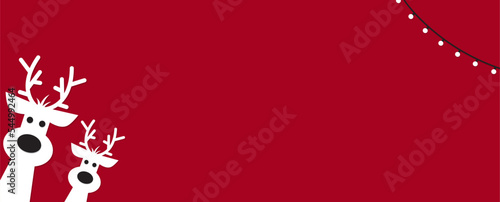 Cute reindeer on a red background. Christmas background, banner ,or card.