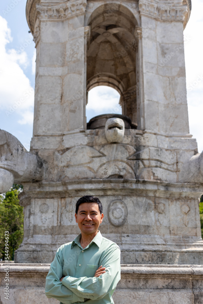 Latin man smiling and looking at camera in guatemala city Latin man smiling and looking at camera in guatemala city