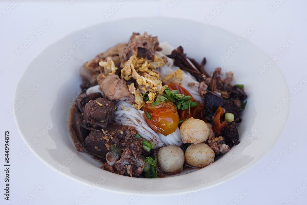 Rice noodles soup or Kanom Jeen Nam Ngeaw, Thai northern traditional food on dish. Concept : Local healthy food in north of Thailand, popular menu. Rice noodles soup or Kanom Jeen Nam Ngeaw, Thai northern traditional food on dish. Concept : Local healthy food in north of Thailand, popular menu.
