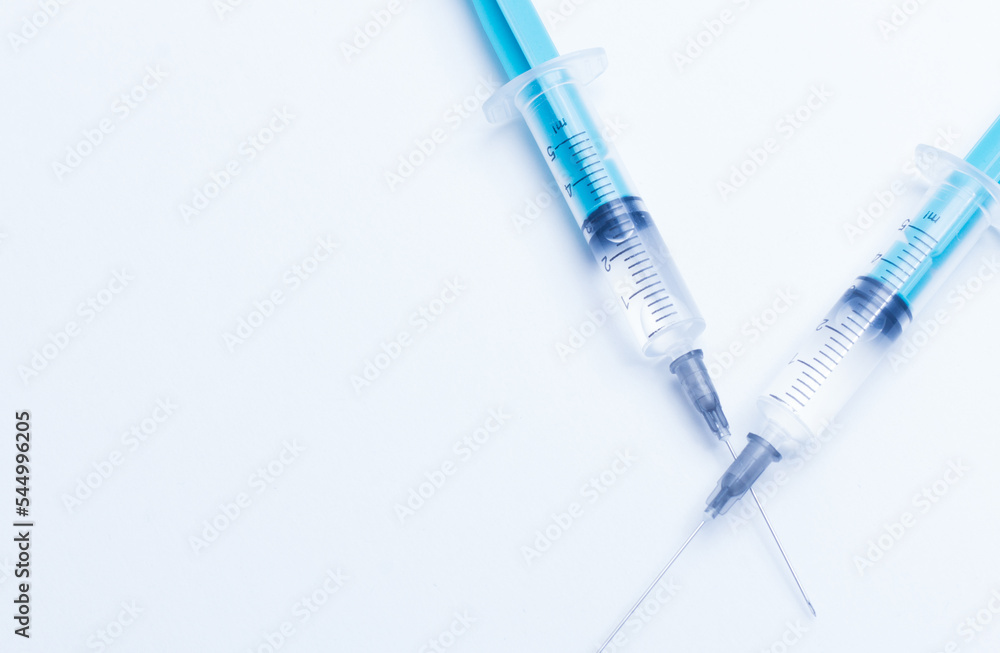 Disposable plastic syringe prepared for injection and vaccination in the hospital. The concept of medicine and health Disposable plastic syringe prepared for injection and vaccination in the hospital. The concept of medicine and health