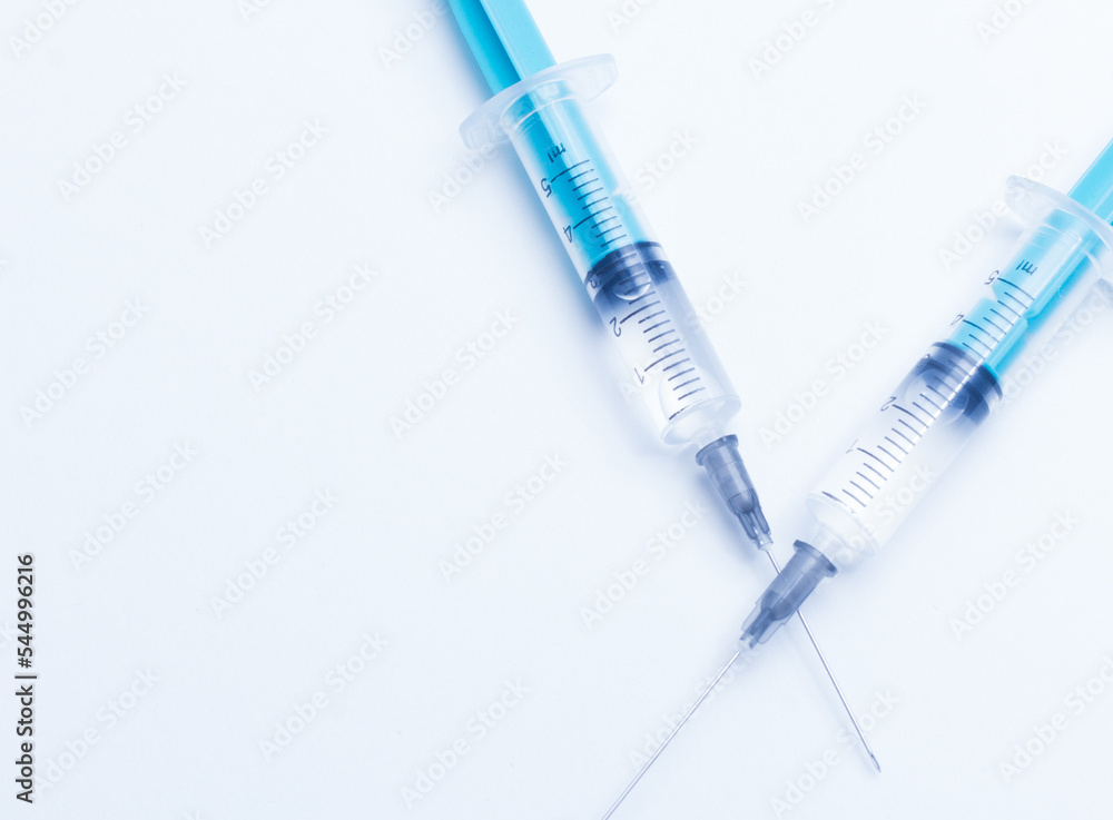 Disposable plastic syringe prepared for injection and vaccination in the hospital. The concept of medicine and health Disposable plastic syringe prepared for injection and vaccination in the hospital. The concept of medicine and health
