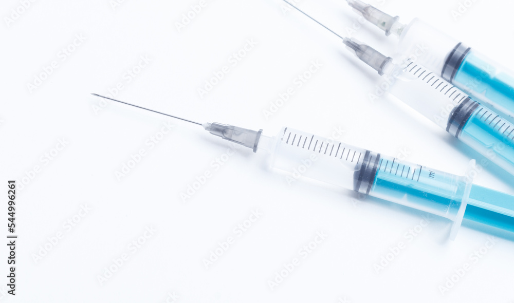 Disposable plastic syringe prepared for injection and vaccination in the hospital. The concept of medicine and health Disposable plastic syringe prepared for injection and vaccination in the hospital. The concept of medicine and health