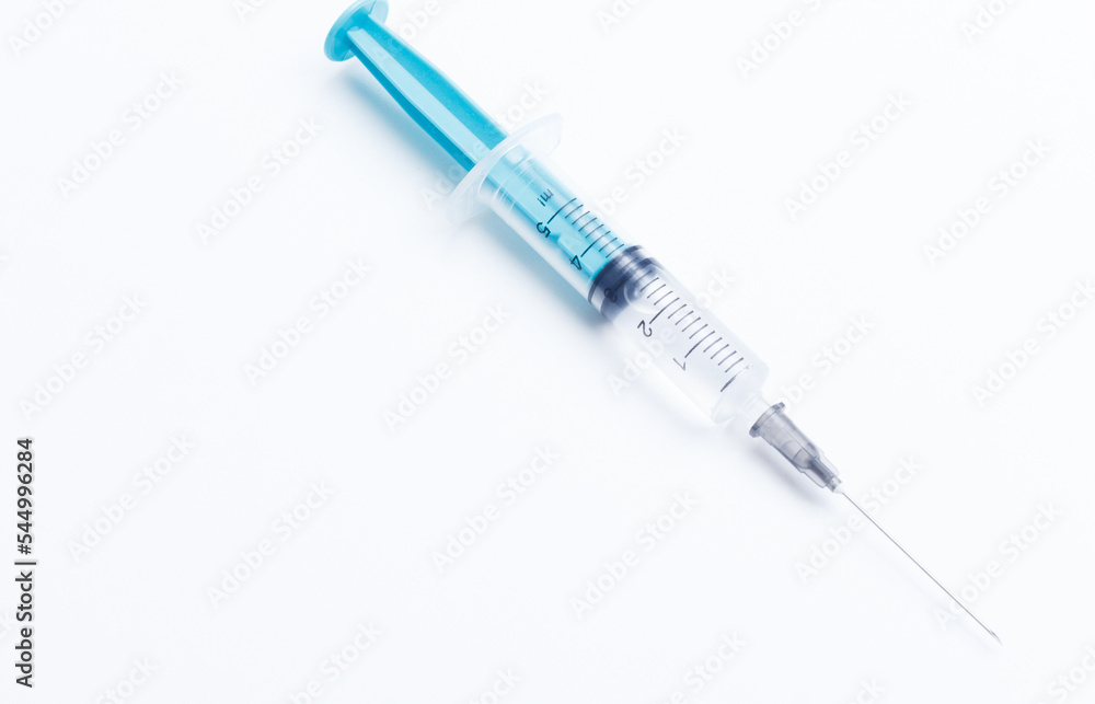 Disposable plastic syringe prepared for injection and vaccination in the hospital. The concept of medicine and health Disposable plastic syringe prepared for injection and vaccination in the hospital. The concept of medicine and health