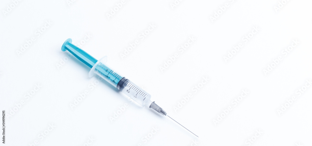 Disposable plastic syringe prepared for injection and vaccination in the hospital. The concept of medicine and health Disposable plastic syringe prepared for injection and vaccination in the hospital. The concept of medicine and health