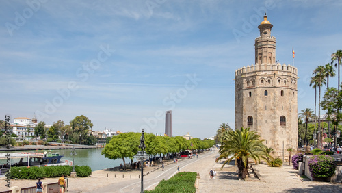 The Golden Tower located on the left bank of Guadalquivir River, historic military observation tower and Spanish cultural heritage monument known as Torre del Oro, Seville, Andalusia, Spain