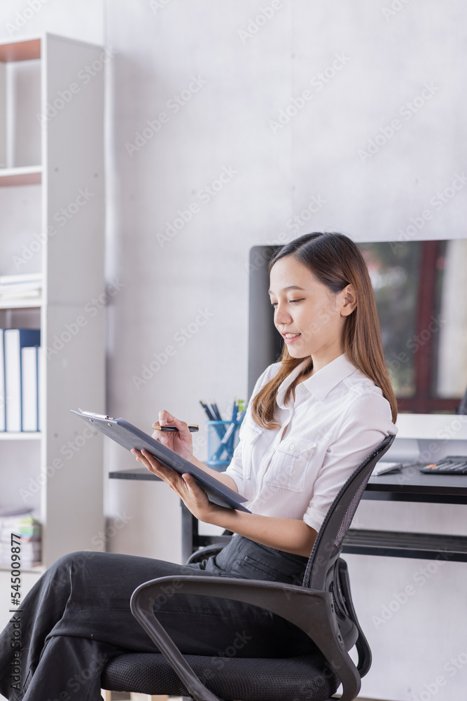Asian Accounting businesswoman working on note laptop computer and analyzing real estate investment data, Financial and tax systems concept.
Asian Accounting businesswoman working on note laptop computer and analyzing real estate investment data, Financial and tax systems concept.