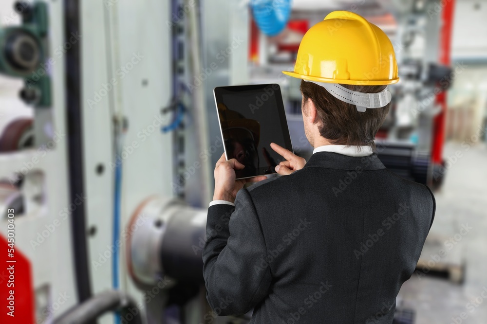 Industrial worker engineer controlling work Industrial worker engineer controlling work