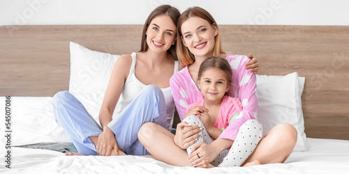 Happy lesbian couple with l...