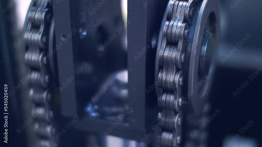 Chain driven hoist, steering wheel, control levers and pedals of the new modern powerful forklift. Shot in motion. Closeup. Follow focus. Shallow depth of field Chain driven hoist, steering wheel, control levers and pedals of the new modern powerful forklift. Shot in motion. Closeup. Follow focus. Shallow depth of field