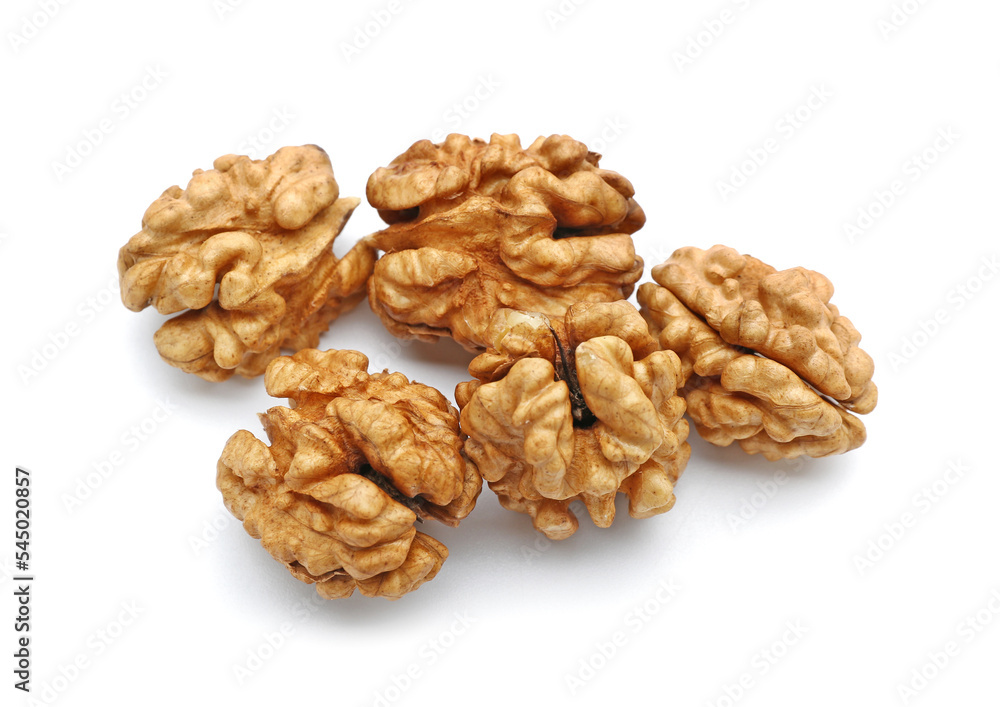 Heap of fresh walnut kernels on white background Heap of fresh walnut kernels on white background