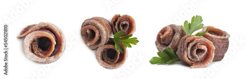 Set with delicious rolled anchovy fillets on white background. Banner design
