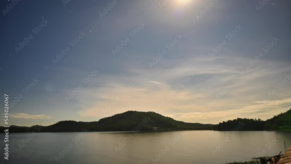 Full moon timelapse along with stars near Pench dam of Pench National Park Full moon timelapse along with stars near Pench dam of Pench National Park
