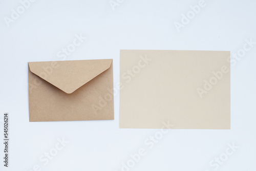 Brown paper and envelopes on white background. © Bowonpat