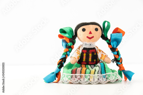 Tradicional mexican doll in a colorful dress of Mexico from Queretaro, hand crafted, front view - Muñeca mexicana