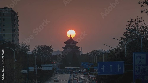Sunset view of one of the streets of Beijing - the capital of China, whose history goes back three millennia. (time-lapse) photo