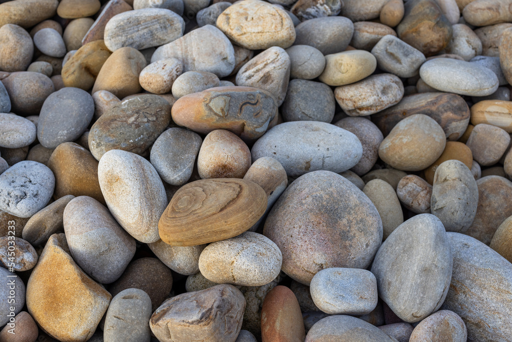 Pebble stone over the sea beach background Pebble stone over the sea beach background