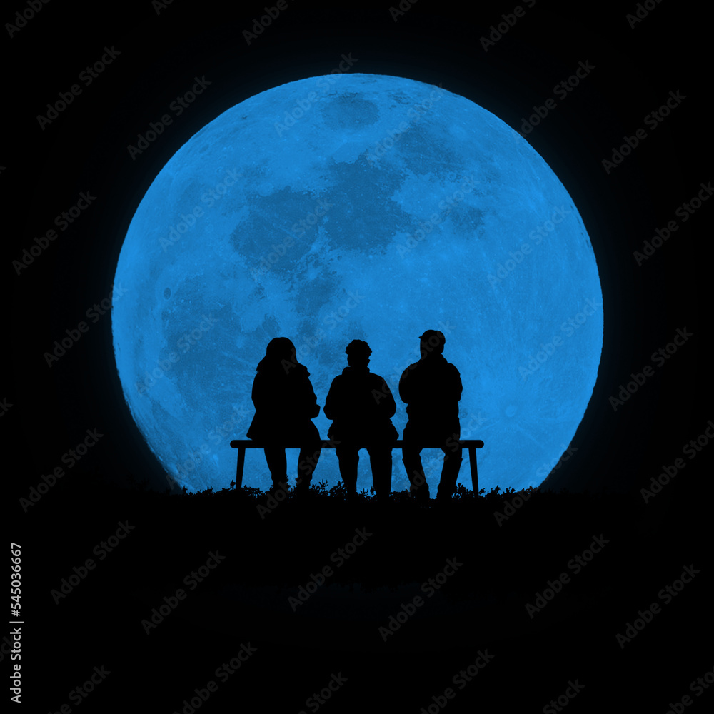 Three friends with a blue moon in the background