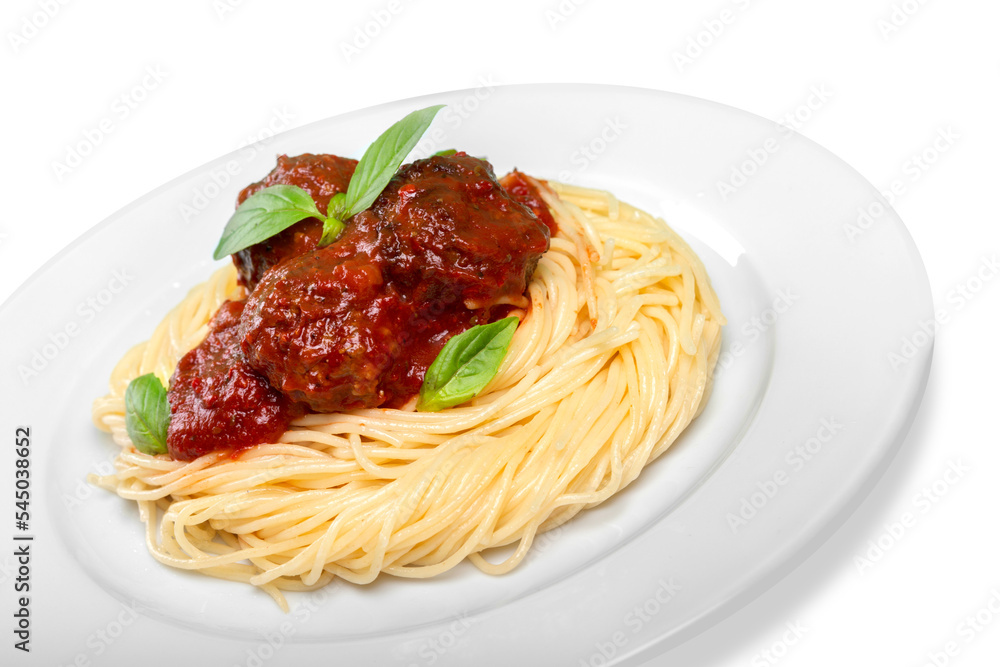 Spaghetti pasta with tomatoes and basil on plate Spaghetti pasta with tomatoes and basil on plate