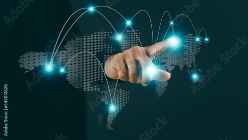 Businessman touching global networking and data exchanges customer connection on virtual screen. Network marketing concept.