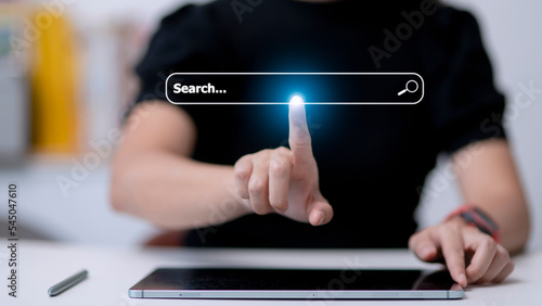 Slika na platnu People hand using laptop or computor searching for information in internet online society web with search box icon and copyspace