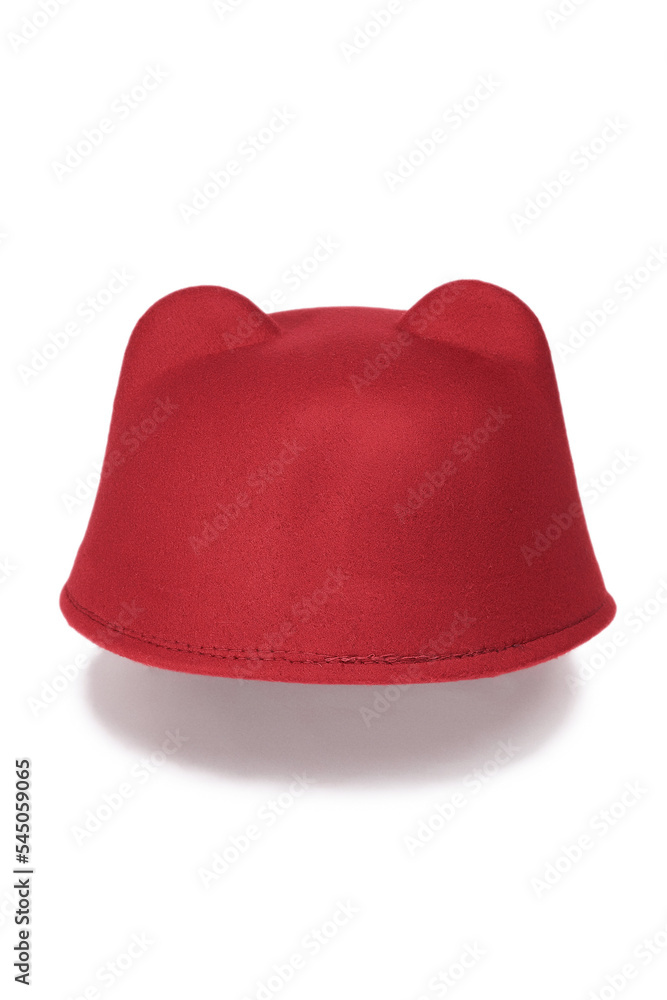 Fototapeta premium Close-up shot of a red felt jockey hat with ears. The casual jockey felt hat with ears is isolated on a white background. Back view.