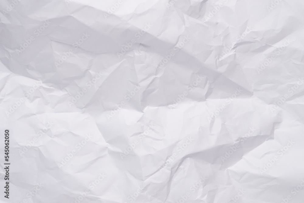 Obraz premium White crumpled paper texture background, clean white wrinkled paper, top view.