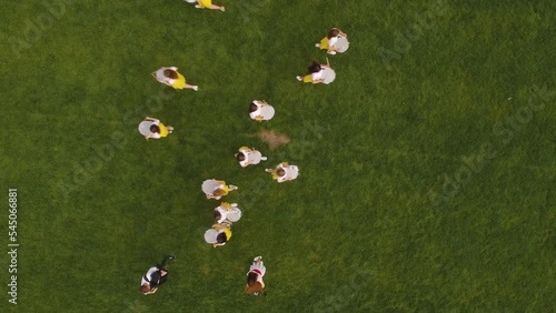 CHORTKIV, UKRAINE - AUGUST 22, 2019: High school football cheerleaders training