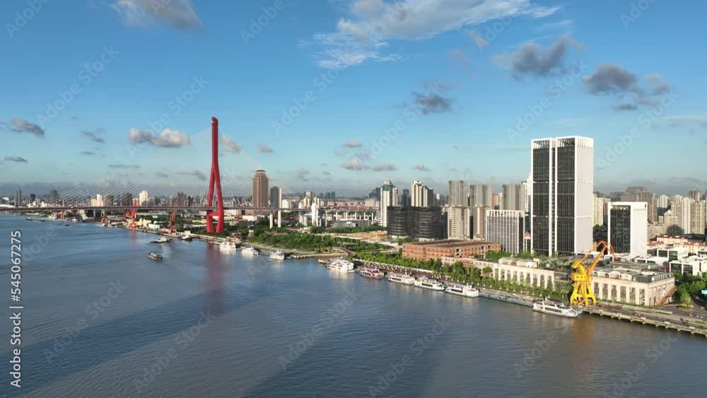 The Huangpu river and city skyline of Shanghai . Drone aerial view. Clear sky and blue river in sunny day during hour in Shanghai China. Cityscape, business, economy concept b-roll footage. The Huangpu river and city skyline of Shanghai . Drone aerial view. Clear sky and blue river in sunny day during hour in Shanghai China. Cityscape, business, economy concept b-roll footage.