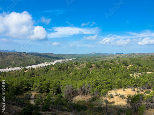 Panoramic view of typical greek mediterranean landscape with hill, fir trees and bushes. Tourism and vacations concept. Rhodos Island, Greece. © familie-eisenlohr.de