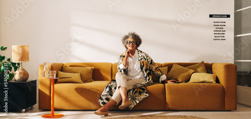 Mature businesswoman sitting in a coworking office