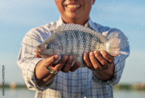 Aquaculture farmers hold quality tilapia yields in hand