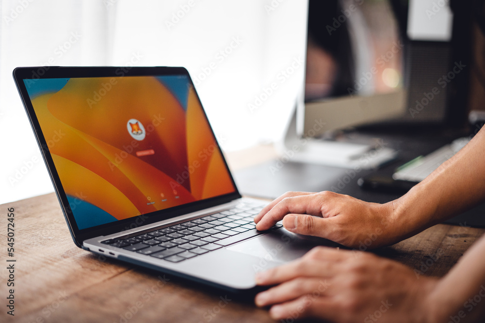 Close up of businessman working and login on laptop Close up of businessman working and login on laptop