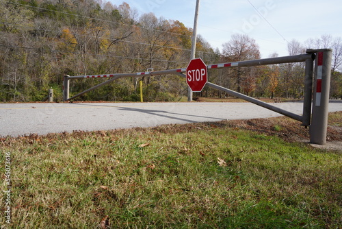 Gated Road Barrier with Stop Sign 
