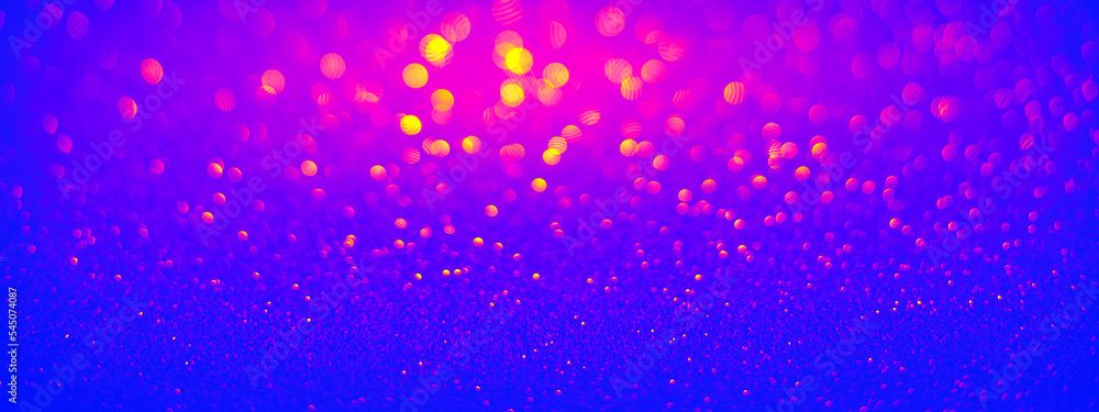 Red and blue glitter texture with bokeh lights glowing in the dark