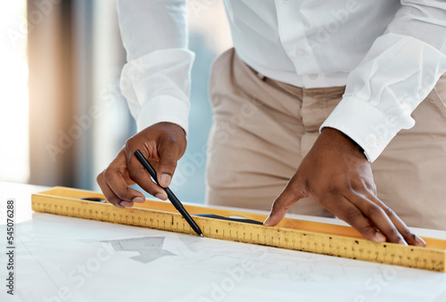 Measure, blueprint and architecture hands drawing lines for project development construction planning and design process contractor. Floor plan and tools of civil engineering black man table zoom photo