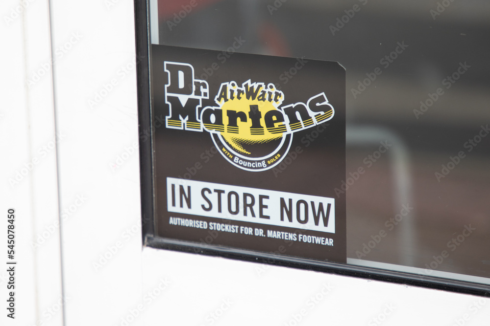 Dr. Martens in store now logo sign store and brand text for British  footwear and clothing fashion chain Stock Photo | Adobe Stock