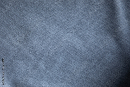 Grey cotton texture canvas fabric background with folds detail of sweater surface