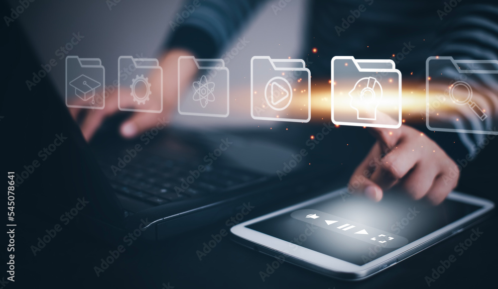 Fototapeta premium Concept E-learning education,Man using laptop with Online Education icon on virtual screen. video internet lessons and online webinar, online lessons on a digital screen.Education internet Technology.