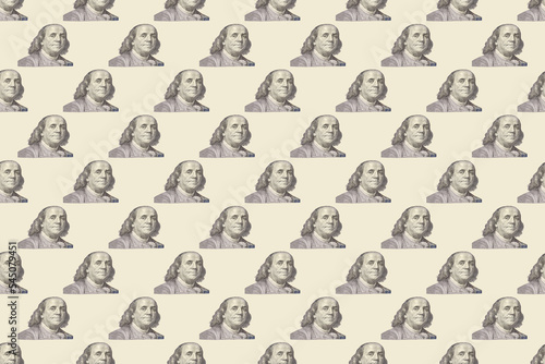 Pattern of Portrait of former U.S. President Benjamin Franklin on the hundred dollars isolated on white background.