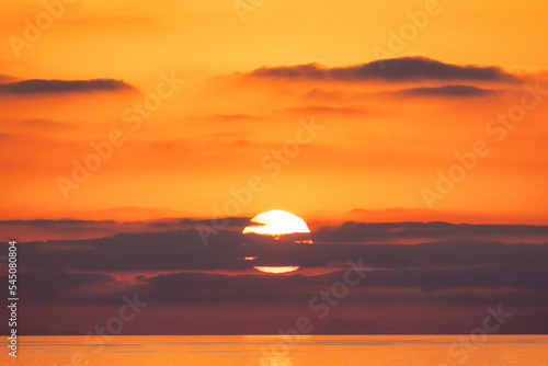 Dramatic Colorful Sunrise Sky over Tyrrhenian Sea. Abstract Red Sky. Cloudscape Nature Background.