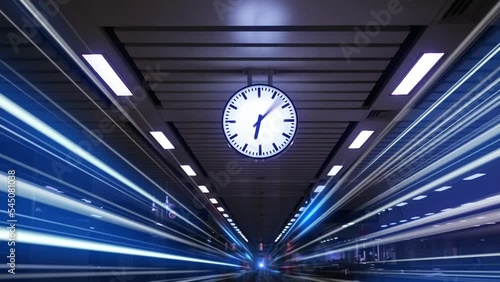 Rush hour Fast moving evening ,Fast moving traffic drives time lapse clock moving fast light each subway lane effect line light cg