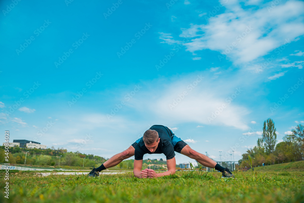 Man strething out muscles before exercise Man strething out muscles before exercise