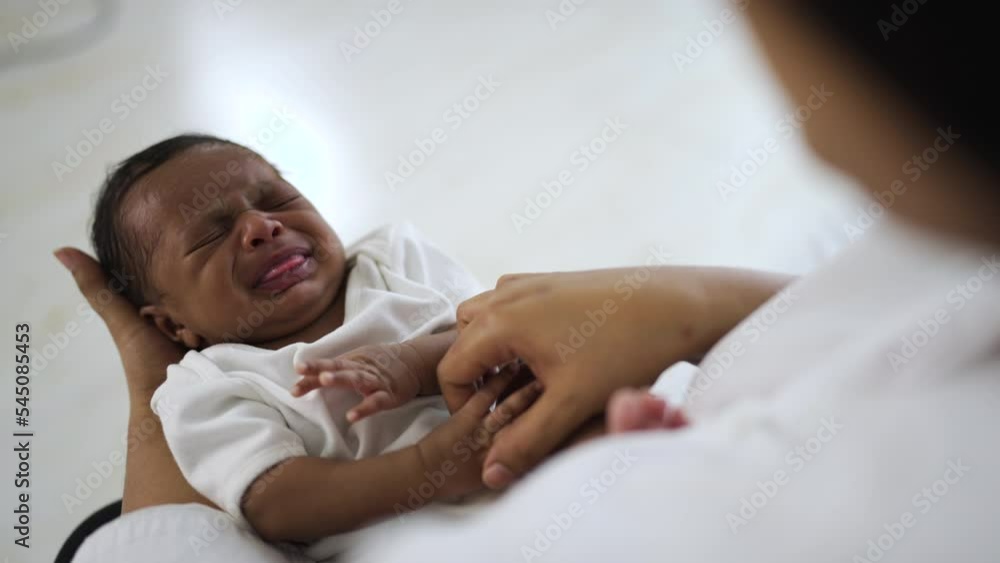Close up mother hands holding newborn african black baby, copy space background banner family concept, Family love newborn healthcare medical concept. Close up mother hands holding newborn african black baby, copy space background banner family concept, Family love newborn healthcare medical concept.
