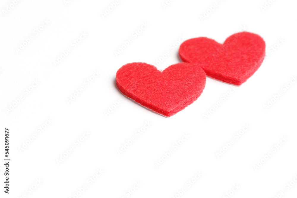Valentines day background with two hearts on the white background. Concept of recognition of love, romantic relationships, Happy Valentine's day. Copy space