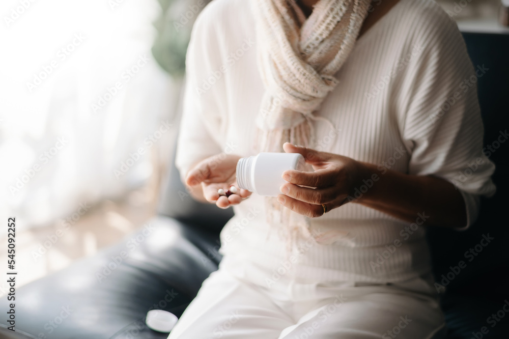 pills in a Senior's hands. Painful old age. Caring for the health of the elderly pills in a Senior's hands. Painful old age. Caring for the health of the elderly