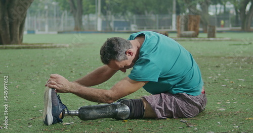 Принти на полотні One motivated older middle aged disabled athlete stretching prosthetic leg