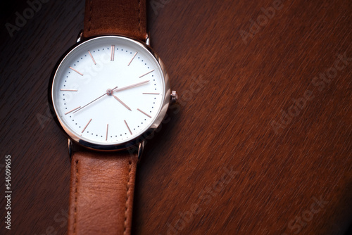 Wallpaper Mural Leather watch with mechanism on orange background Torontodigital.ca